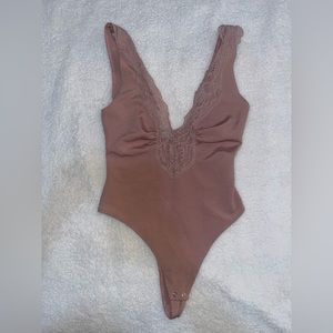 Mauve body suit with lace